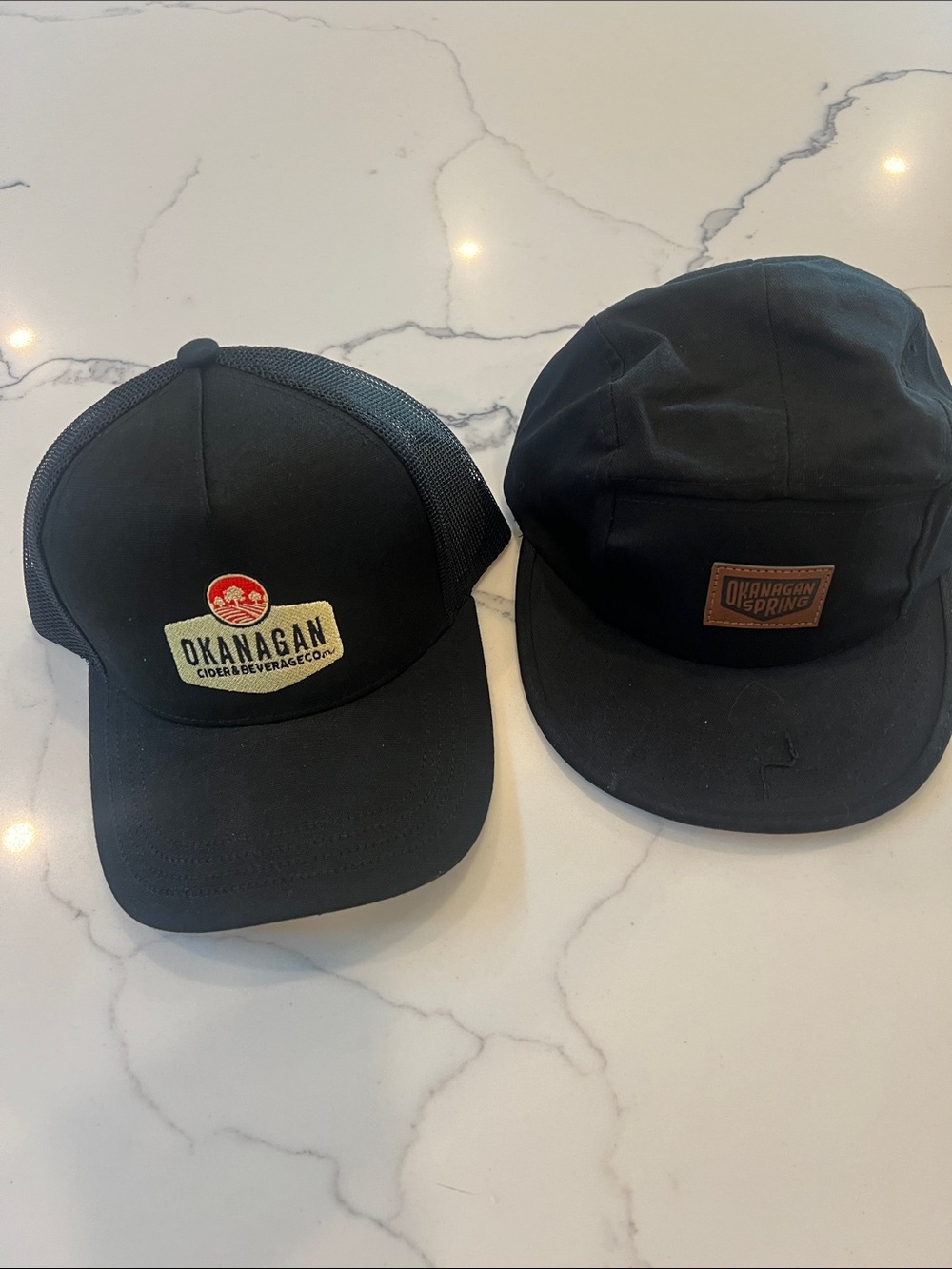 Okanagan Branded Black Trucker & Five-Panel Hats - Set of 2